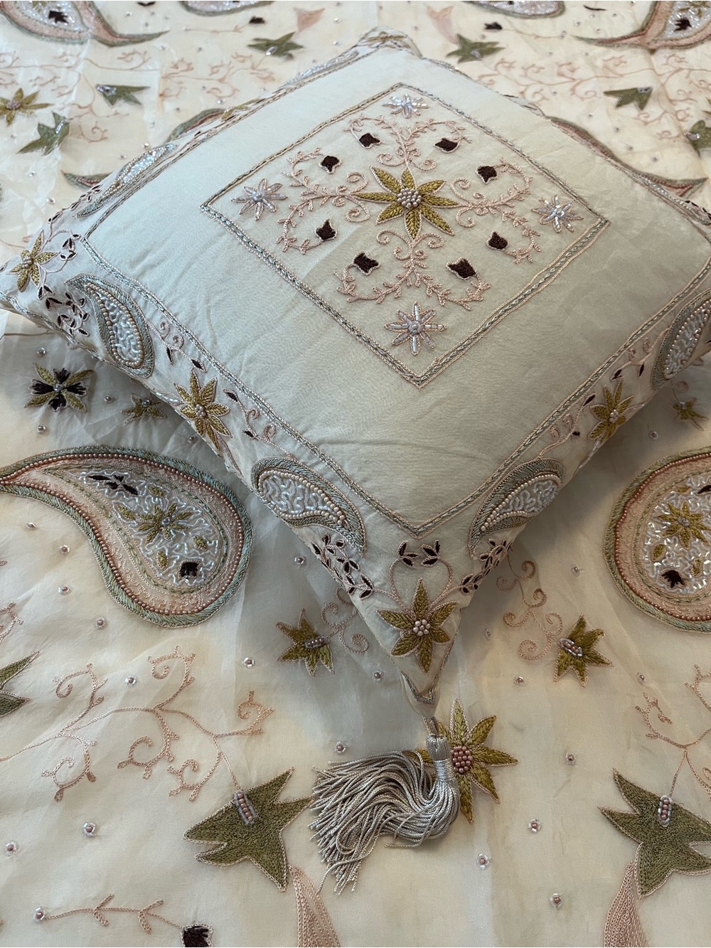 Beaded silk throw and matching pillow.
NWOT.